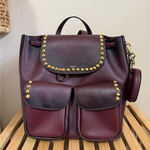 Coach Crosby 28 with studs